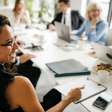 candid-close-up-of-hispanic-businesswoman-in-office-meeting-800x800-3